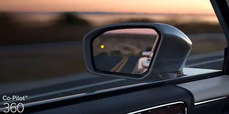 Lincoln vehicle mirror blind spot alert