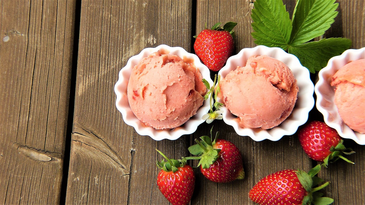 Three scoops of strawberry ice cream