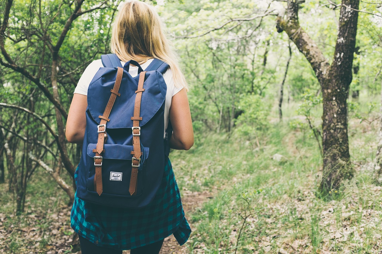 A woman hiking in the woods