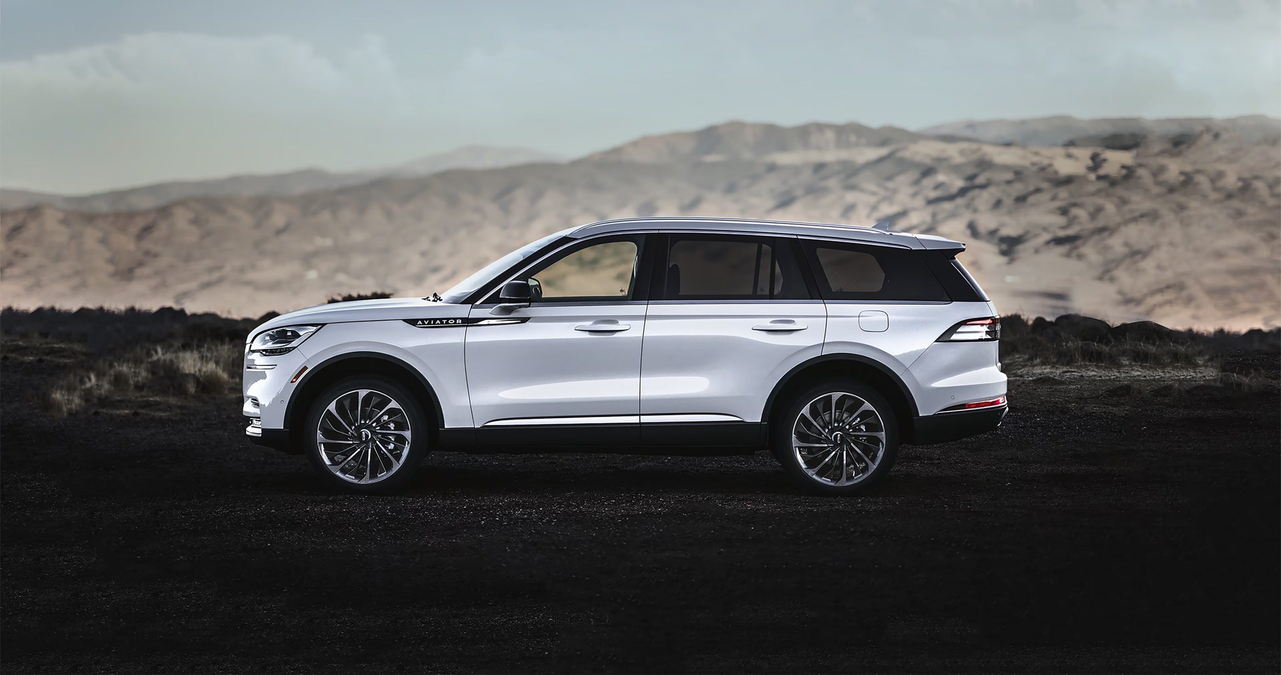 A side view of a parked 2024 Lincoln Aviator Premiere