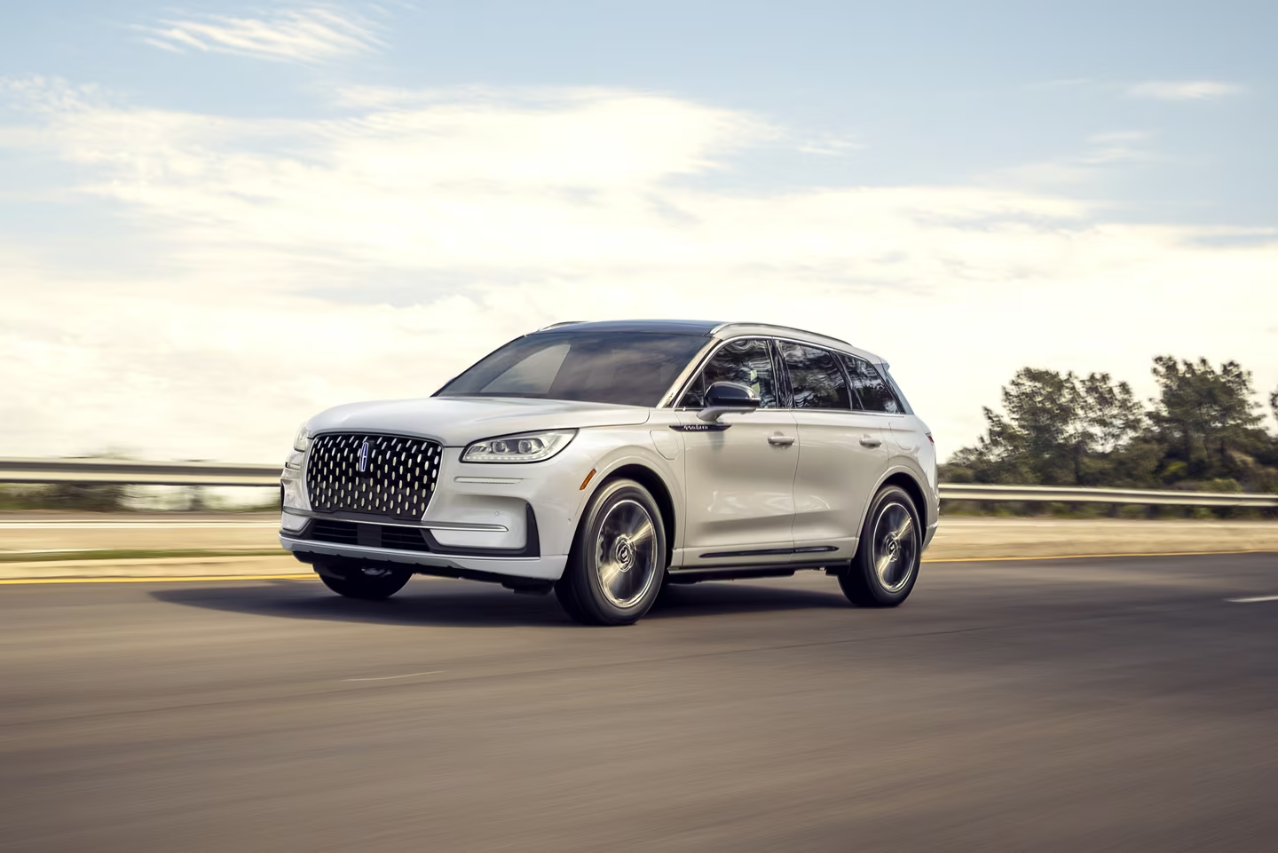 The 2024 Lincoln Corsair Grand Touring driving down the road