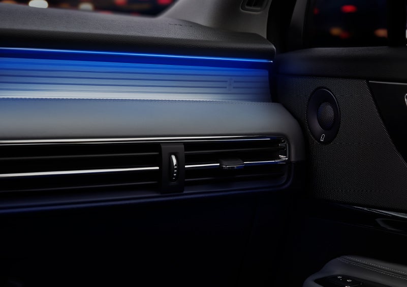A thin available ambient blue lighting illuminates the pinstripe aluminum under an ebony dashboard, emitting a cool energy | Asheville Lincoln in Asheville NC
