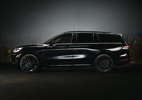 A 2024 Lincoln Aviator® SUV is shown in the Infinite Black exterior color | Asheville Lincoln in Asheville NC
