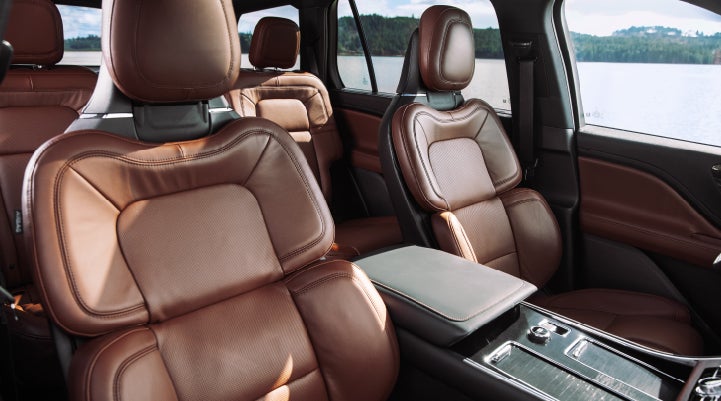 The front row's Perfect Position Seats in a 2024 Lincoln Aviator® Reserve model with Ebony Roast interior | Asheville Lincoln in Asheville NC