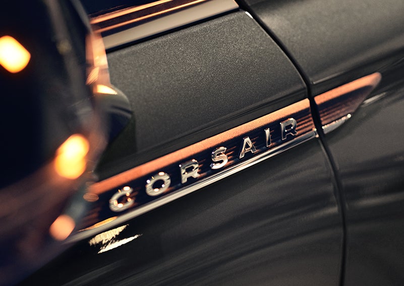 The stylish chrome badge reading “CORSAIR” is shown on the exterior of the vehicle. | Asheville Lincoln in Asheville NC