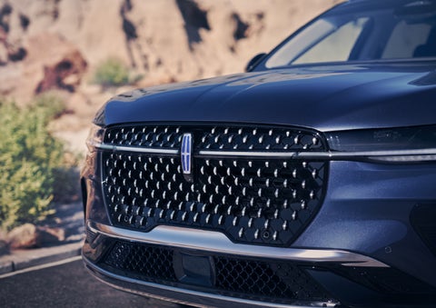 The stylish grille of a 2024 Lincoln Nautilus® SUV sparkles in the sunlight. | Asheville Lincoln in Asheville NC