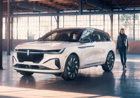 A person approaches a 2024 Lincoln Nautilus® SUV. | Asheville Lincoln in Asheville NC