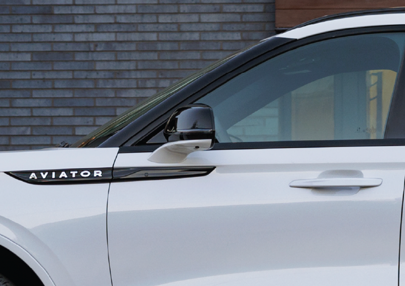 The driver’s door of a white 2025 Lincoln Aviator® SUV is showcased. | Asheville Lincoln in Asheville NC