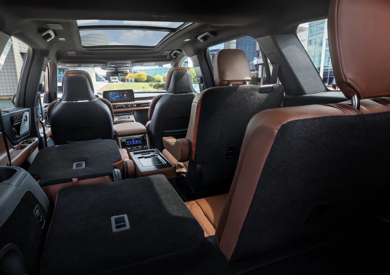 The interior of the 2025 Lincoln Aviator® SUV is shown with two seats folded down for added space. | Asheville Lincoln in Asheville NC