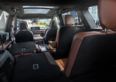 The interior of the 2025 Lincoln Aviator® SUV is shown with two seats folded down for added space. | Asheville Lincoln in Asheville NC