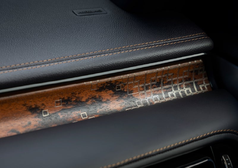 A close-up shot of the 2026 Lincoln Aviator® dashboard with unique black and brown accents and brown stitching. | Asheville Lincoln in Asheville NC