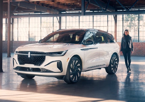 A person approaches a 2026 Lincoln Nautilus® SUV. | Asheville Lincoln in Asheville NC