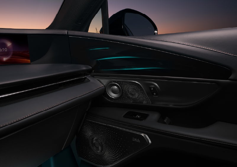 Selectable ambient lighting glows in the passenger door panel. | Asheville Lincoln in Asheville NC