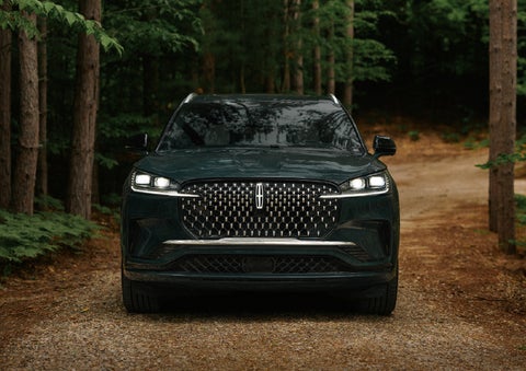 The front grille of a 2027 Lincoln Aviator® Black Label™ SUV is shown. | Asheville Lincoln in Asheville NC
