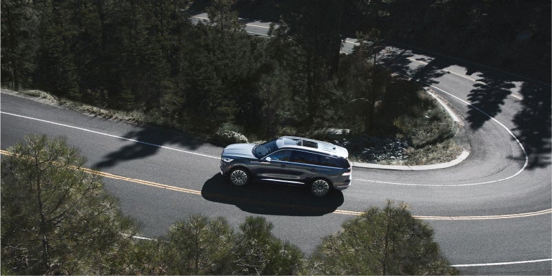 The 2024 Lincoln Aviator driving through the wilderness to Swannanoa from Black Mountain.